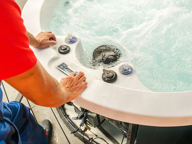 Byers Electric technician completing safe and code-compliant hot tub electrical installation