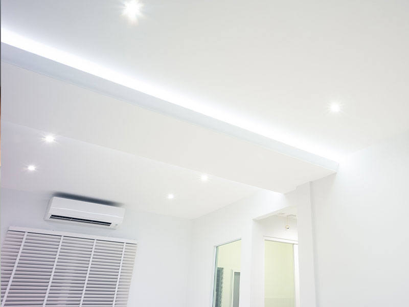Byers Electric modern recessed and cove LED lighting installation in contemporary living space